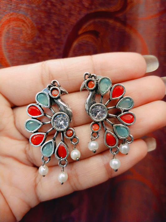 Peacock motif earring