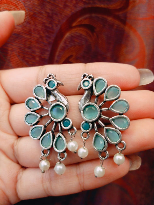Peacock motif earring