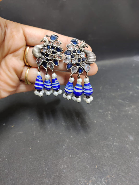Peacock motif brass studs