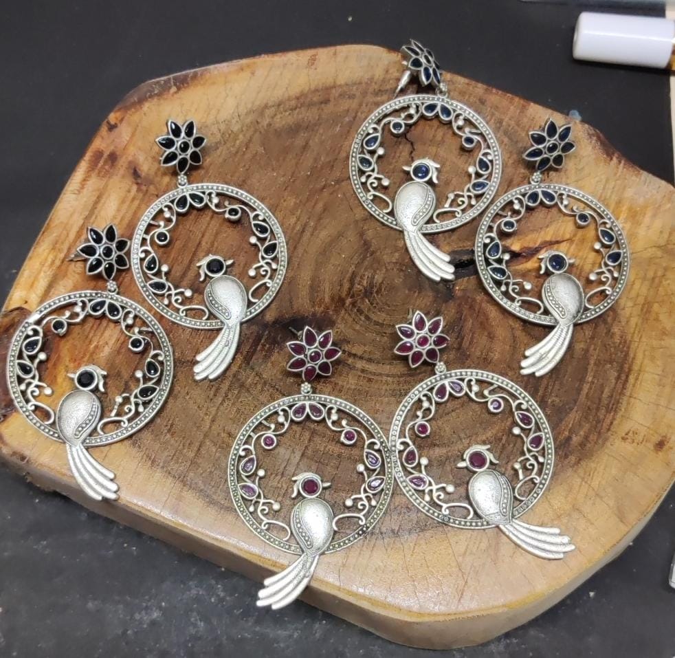 Bird motif big danglers
