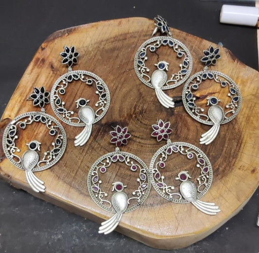 Bird motif big danglers