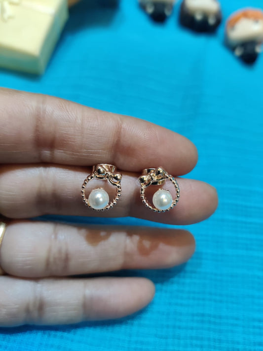 Rose gold chotu studs