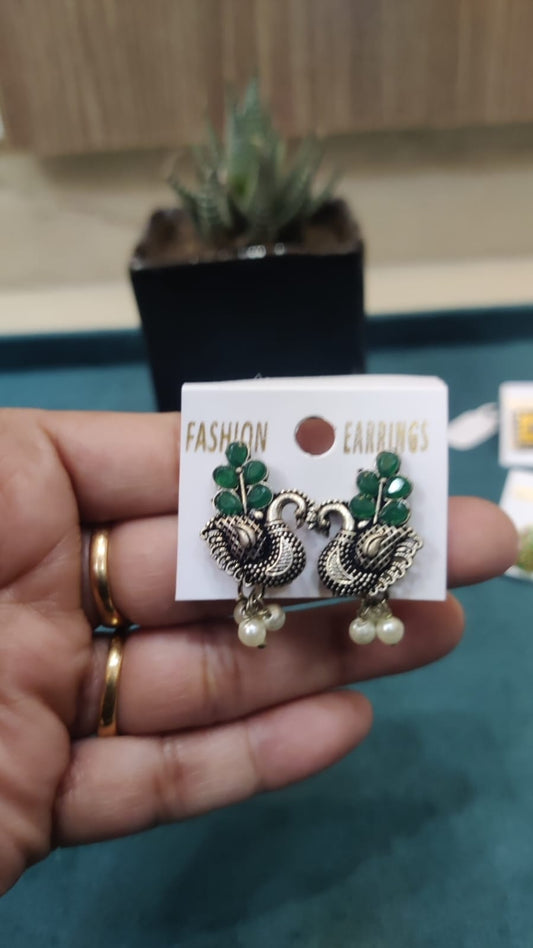 small peacock shaped stud