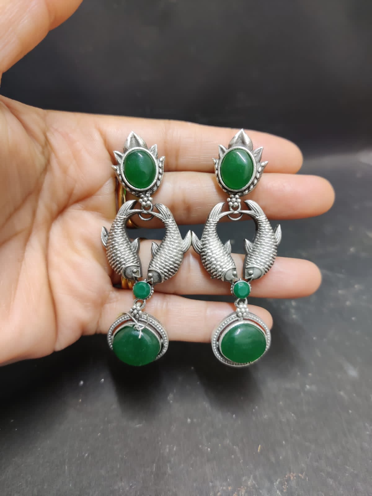 Long fish motif earrings